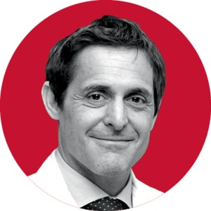 Photo 1: Black and white headshot of middle-aged white man, Dr. Mario Gaudino.