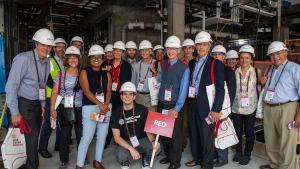 people wearing hard hats and smiling